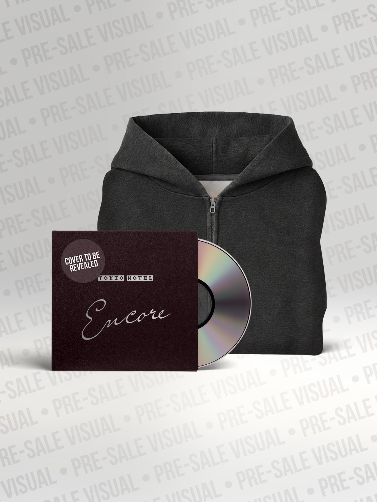 Album + Zip Hoodie Bundle
Bundle aus dunkelgrauem Zip-Hoodie und der Tokio Hotel „Encore“ CD im Digipak. Das Hoodie-Design und das Albumcover sind teilweise verdeckt mit dem Hinweis „Cover to be revealed“.